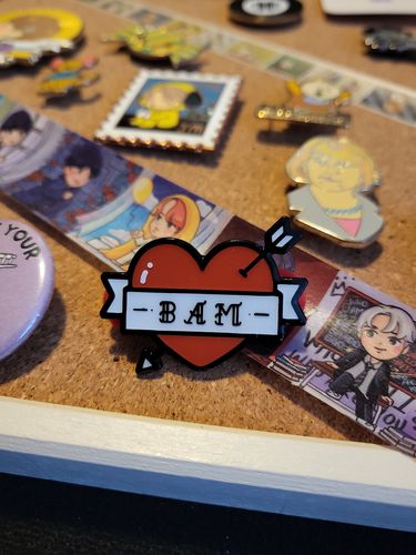 Customer photo review of Jungkook Tattoo Pins