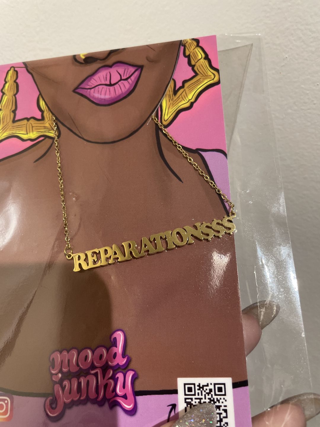 Customer photo review of Mood Junky Reparations 18k gold plated Necklace