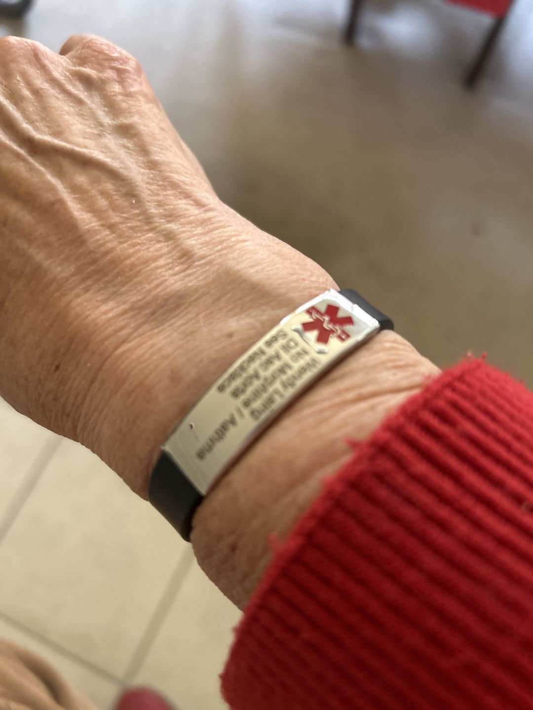 Customer photo review of Personalised Black Silicone Medical Alert ID Bracelet