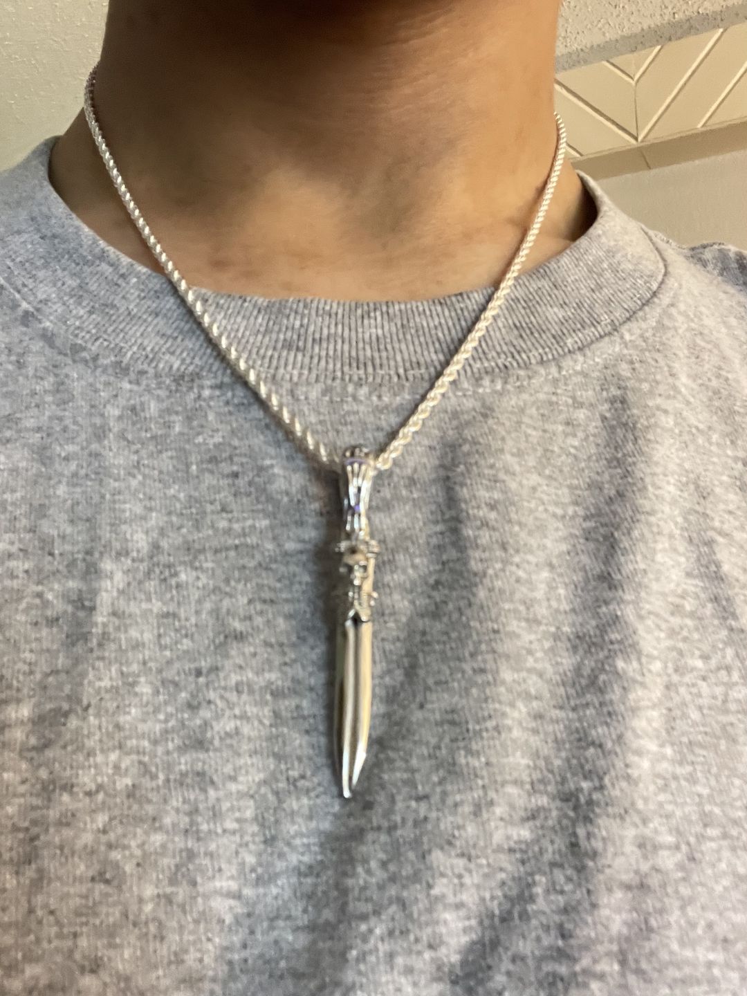 Customer photo review of CATACOMB SWORD PENDANT