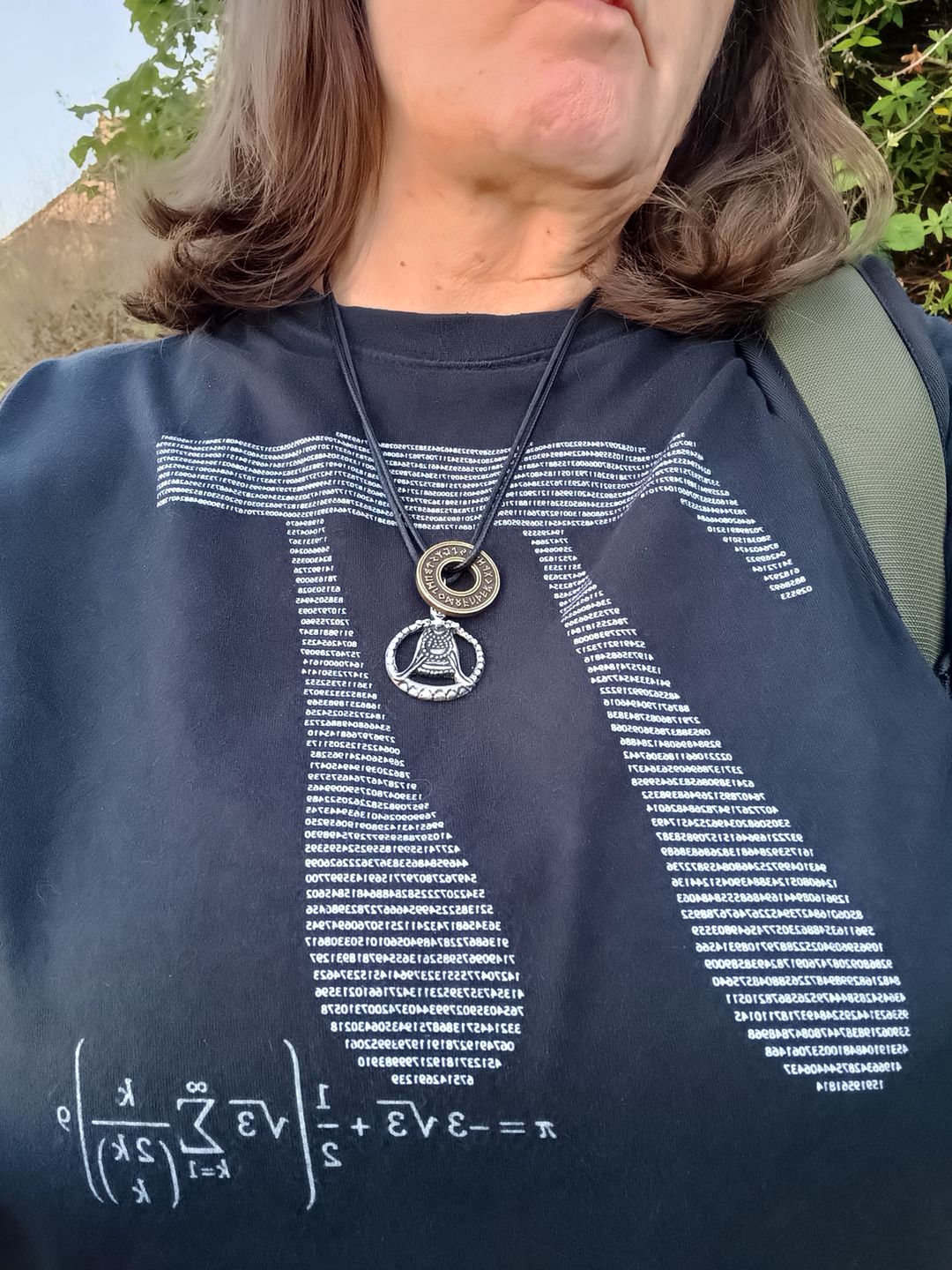 Customer photo review of Runed Coin Pendant