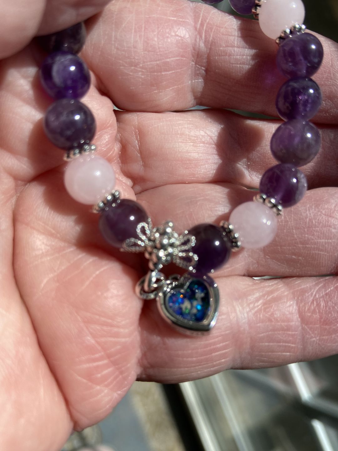 Customer photo review of Amethyst and Rose Quartz Healing Bracelet with Cremation Ashes
