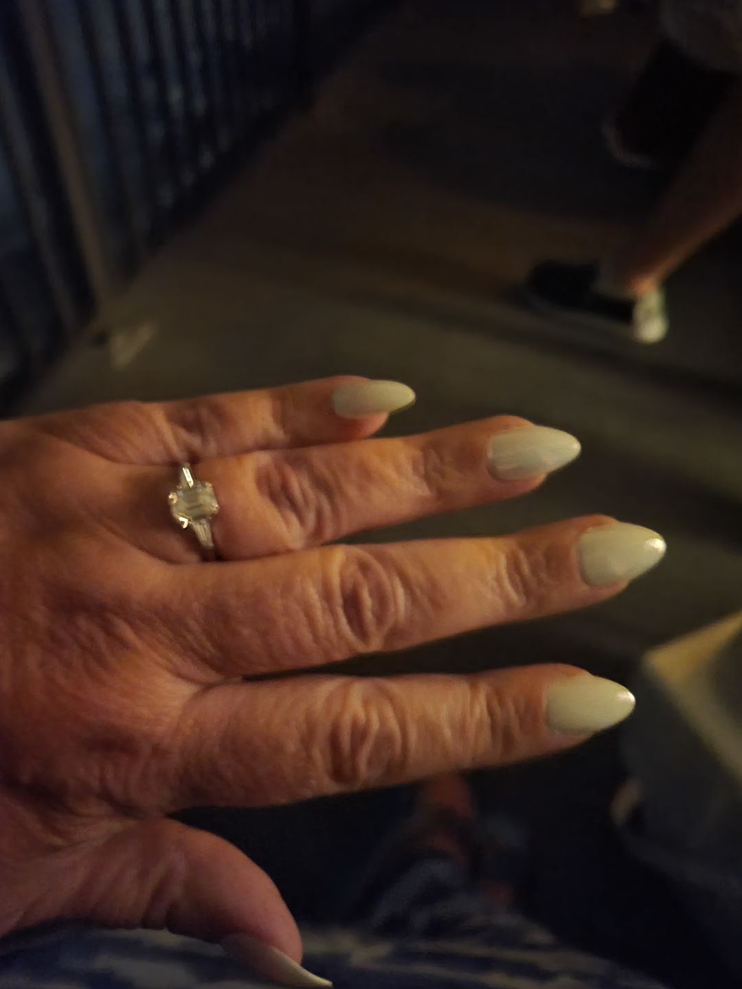 Customer photo review of Three Stone Emerald Cut Moissanite Tapered Baguette Engagement Ring