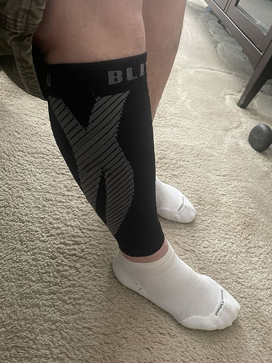 Customer photo review of Calf Sleeves | 20-30 MMHG Recovery Wrap for Calf & Shin Pain Relief w/ KT Technique