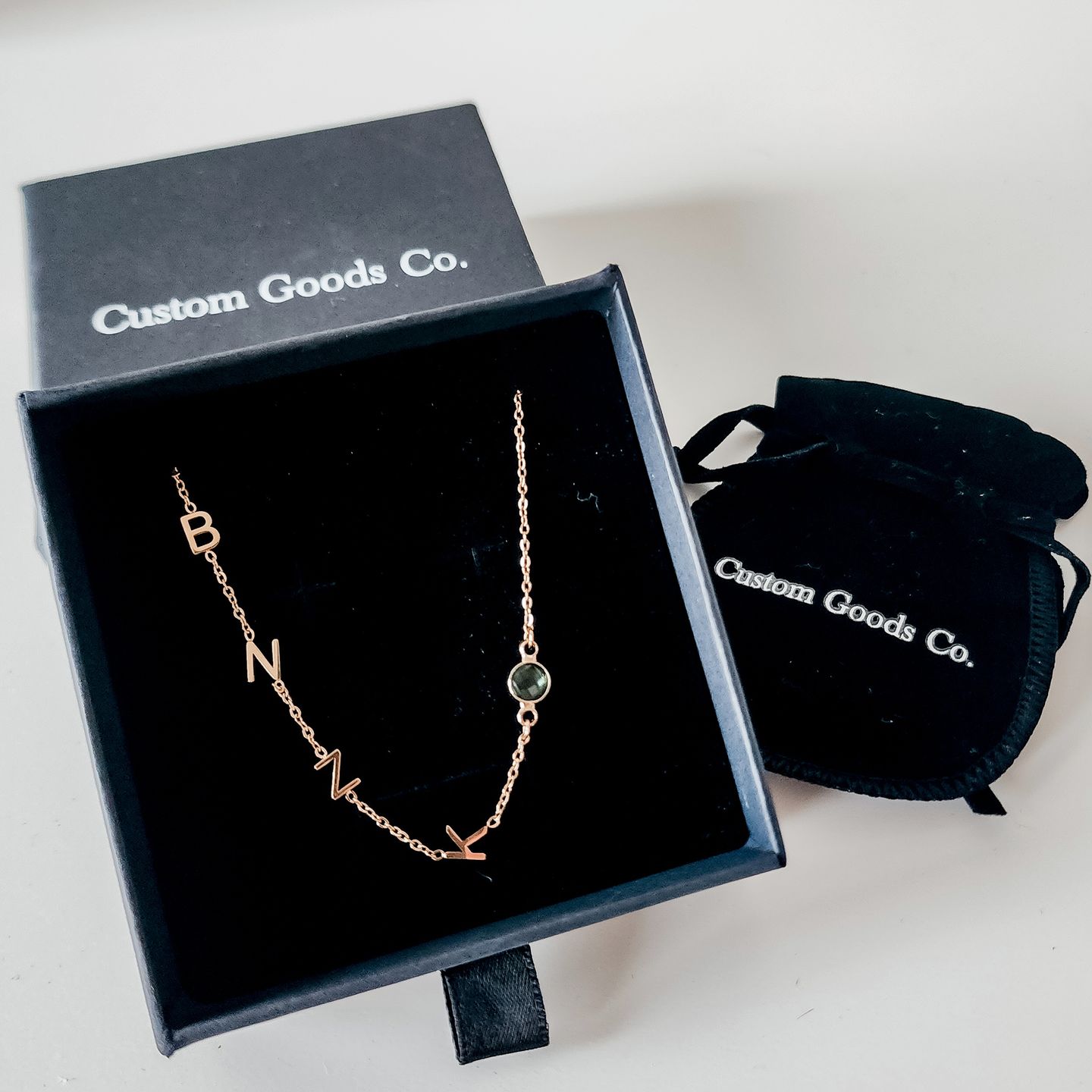 Customer photo review of Birthstone Initial Necklace