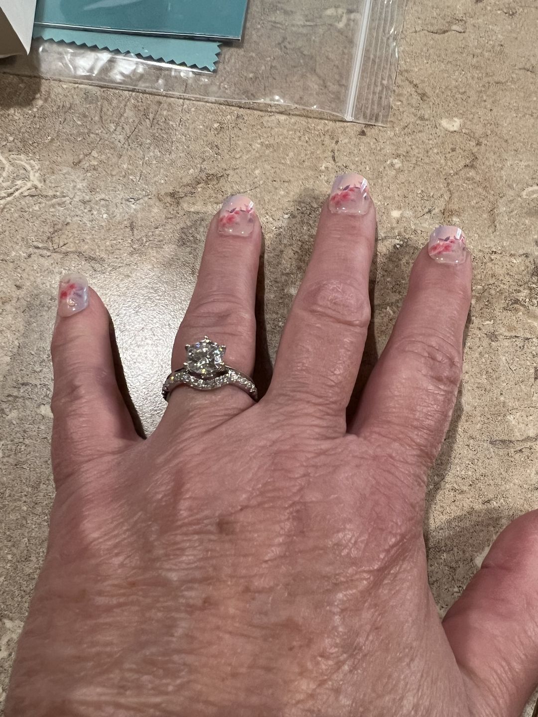 Customer photo review of Classic Solitaire Moissanite Six-Prong Sterling Silver Ring