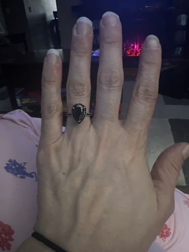Customer photo review of Louily Unique Pear Cut Halo Black Diamond Engagement Ring In Sterling Silver