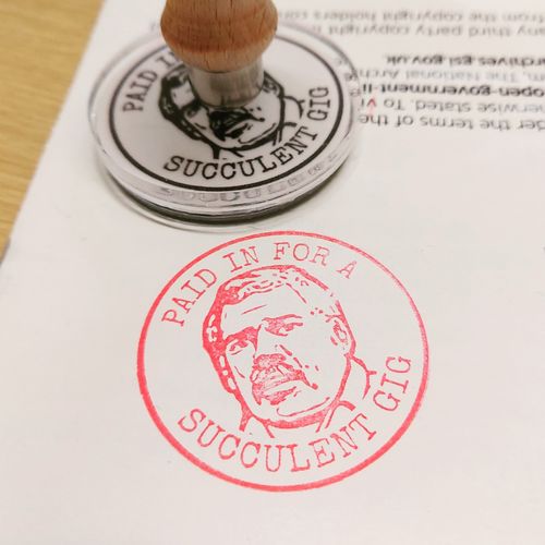 Customer photo review of Wooden Handle Face Stamp