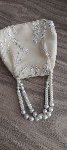 Customer photo review of Rubans Cream Coloured Potli Handbag With Silver Embroidery And Pearls