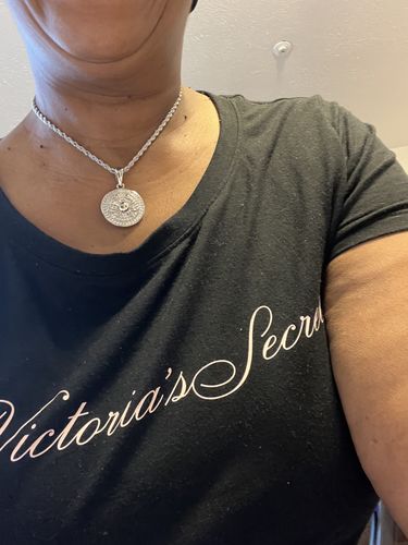 Customer photo review of DIAMOND ZODIAC CIRCLE PENDANT