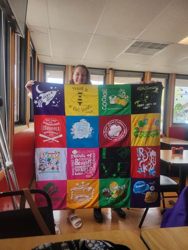 T-shirt quilt with girl scouts, community service themes by Kristine from IL