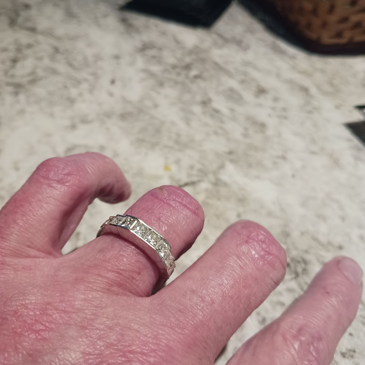 Customer photo review of Princess Moissanite Staircase Channel Set Half Eternity Wedding Band