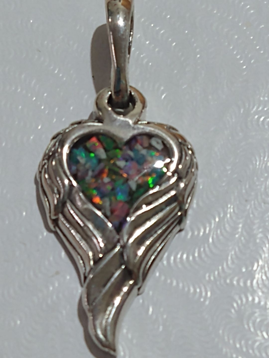 Customer photo review of Petite Angel Wing Pendant - Engravable