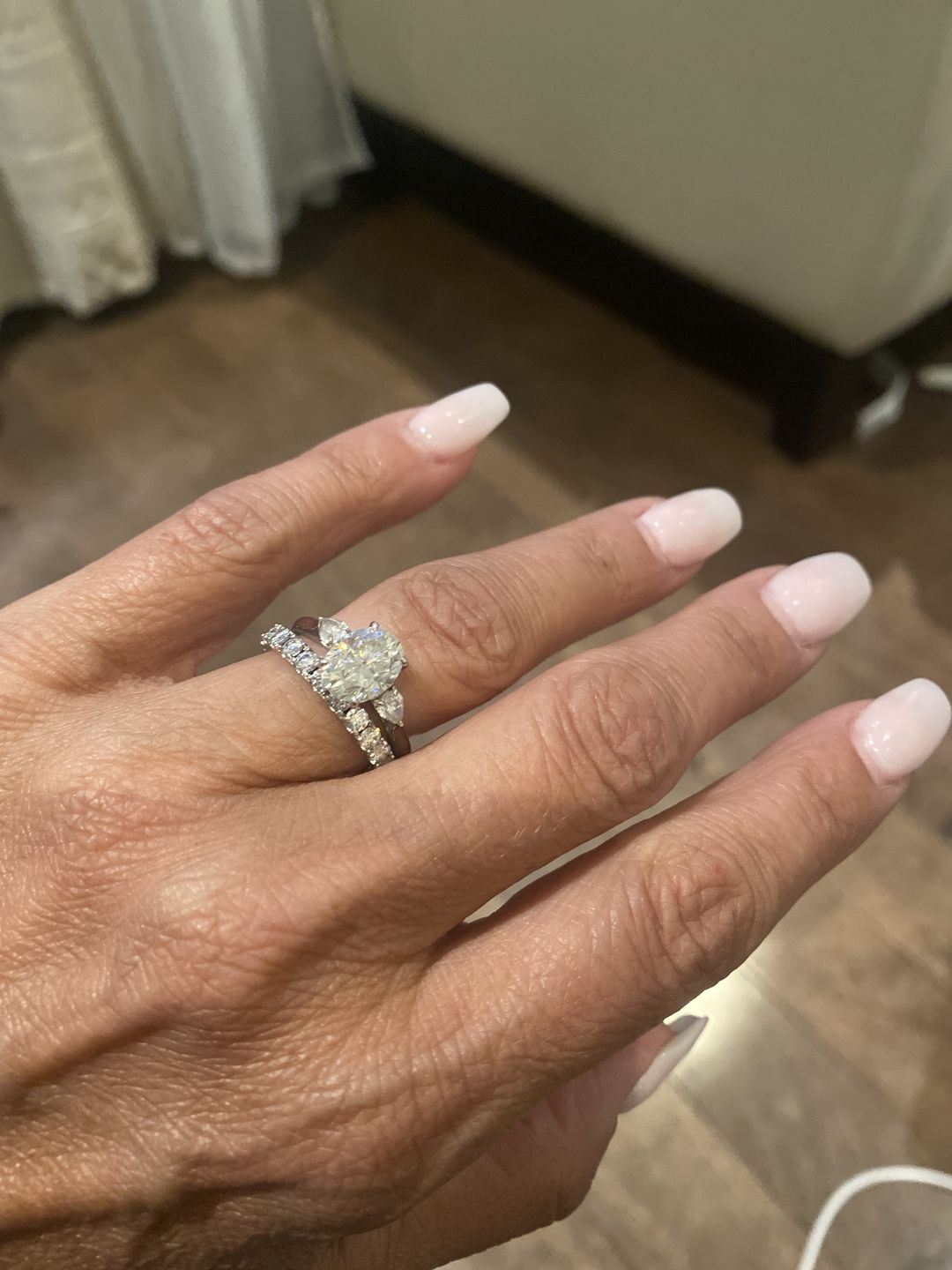 Customer photo review of Pave Moissanite Eternity Wedding Band Ring In Sterling Silver
