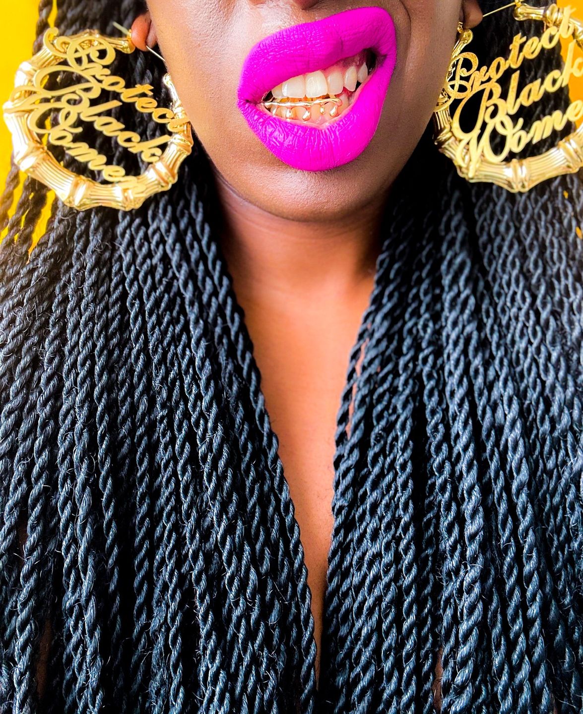 Customer photo review of 18k Gold Plated Protect Black Women Bamboo Hoop Earrings