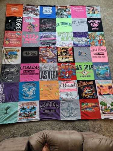 T-shirt quilt with travel, beaches themes by Lucinda from WI