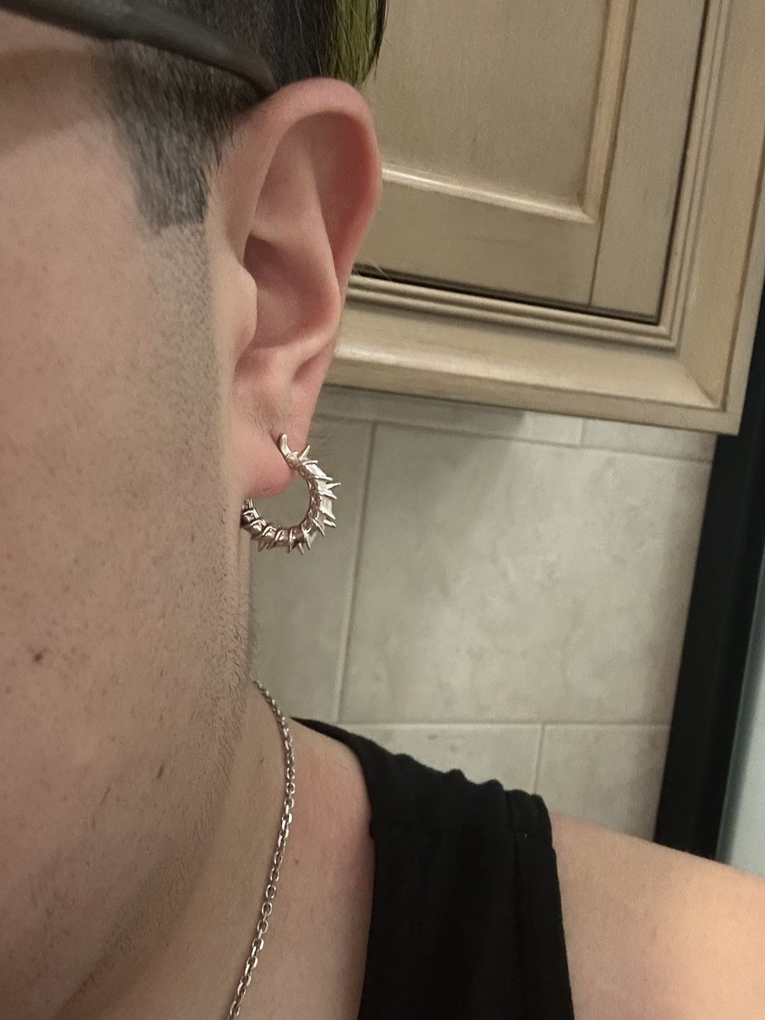Customer photo review of ARMORED OPEN HOOP EARRING