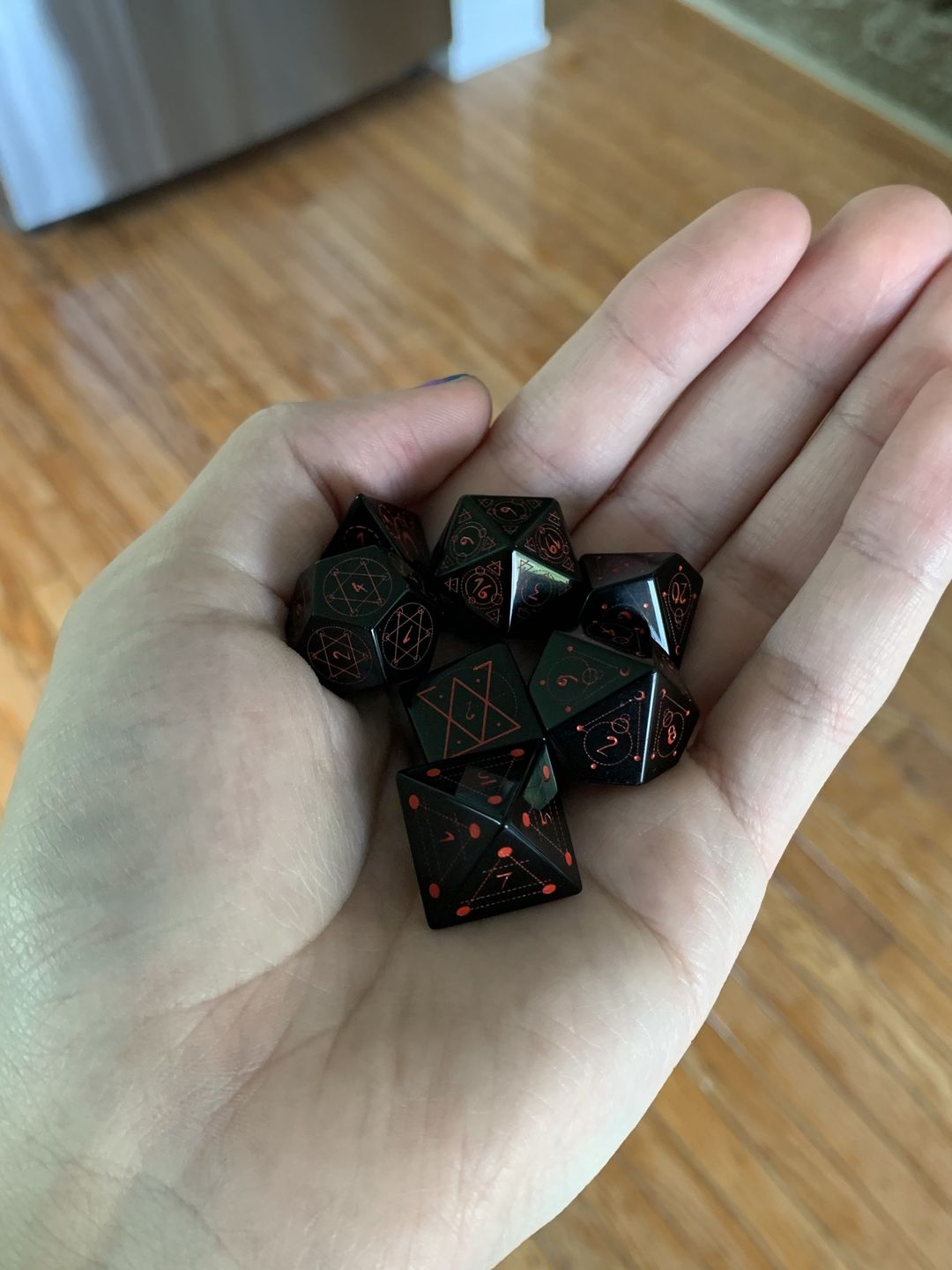 Customer photo review of SPELLCASTER BLACK OBSIDIAN STONE DICE SET
