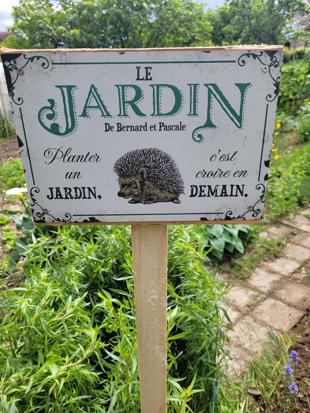 Customer photo review of Joie dans le jardin - Plaque de porte personnalisée