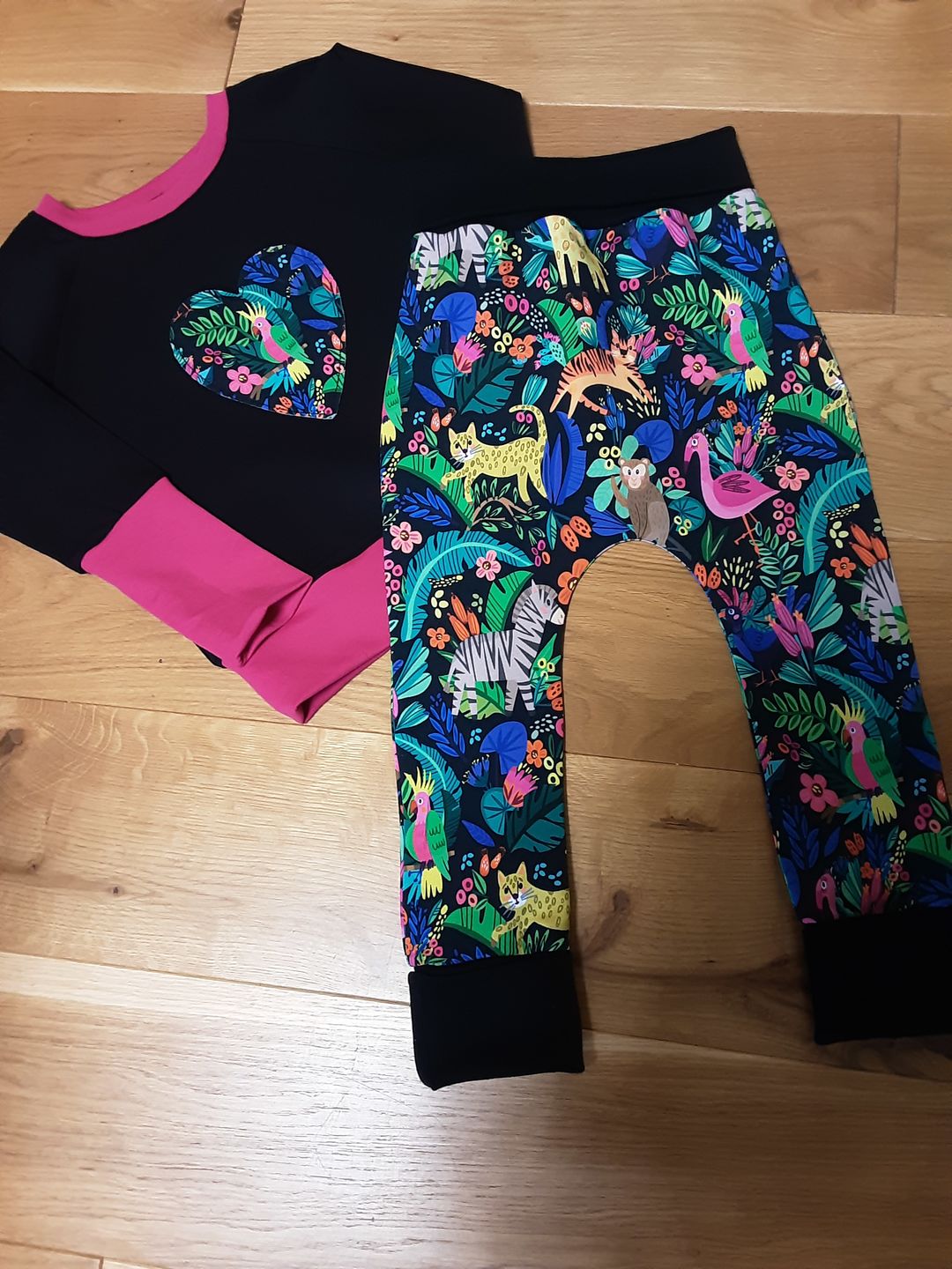 Customer photo review of Animal Jungle on Black French Terry Fabric