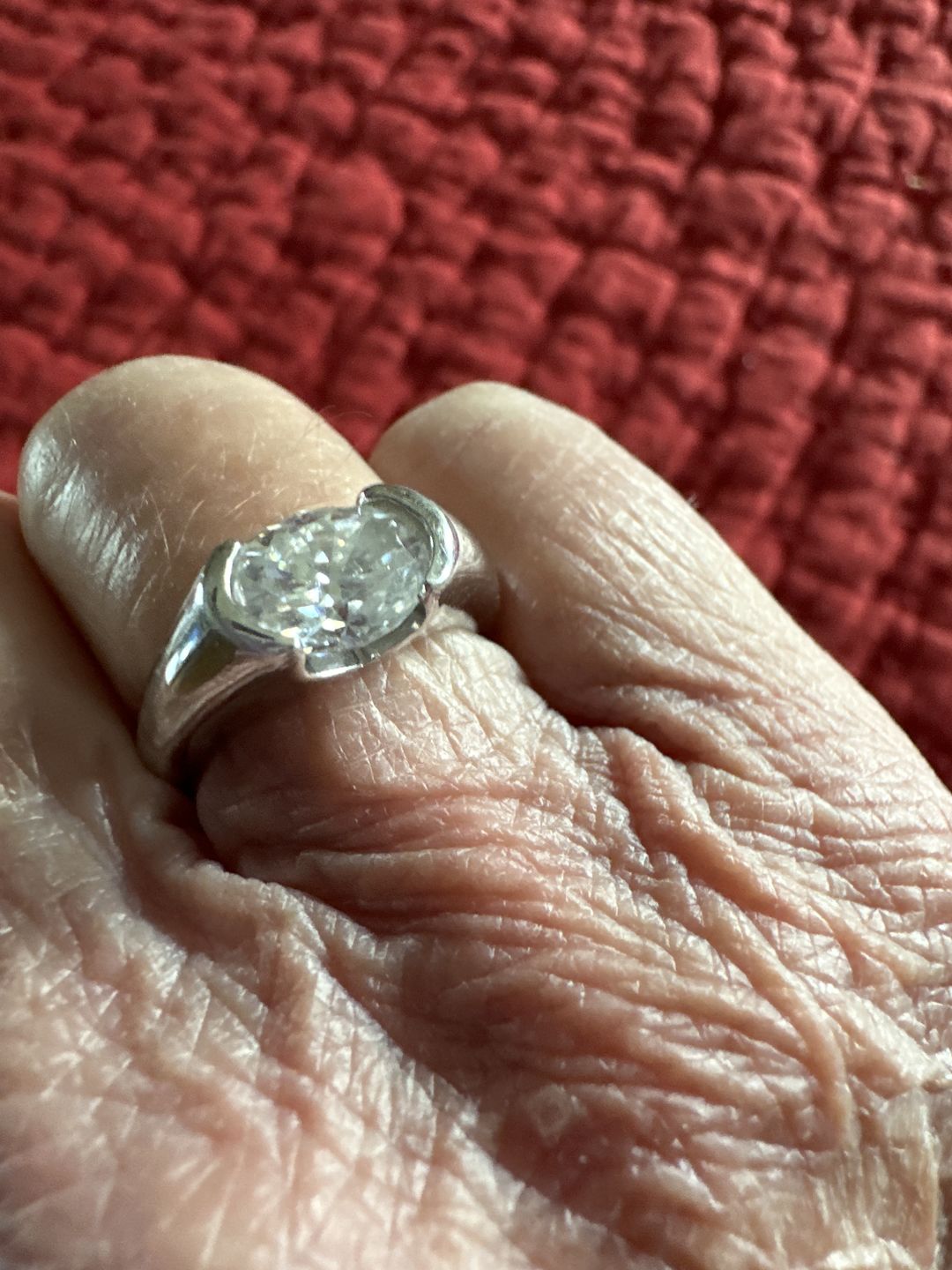 Customer photo review of Solitaire Oval Moissanite Half Bezel Set Engagement Ring