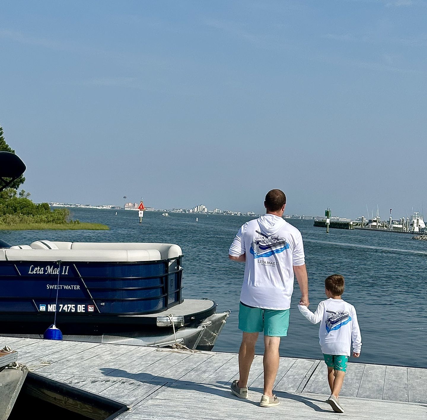 Customer photo review of Youth Captain & Crew Drifit Custom Boat Shirts - Long Sleeve
