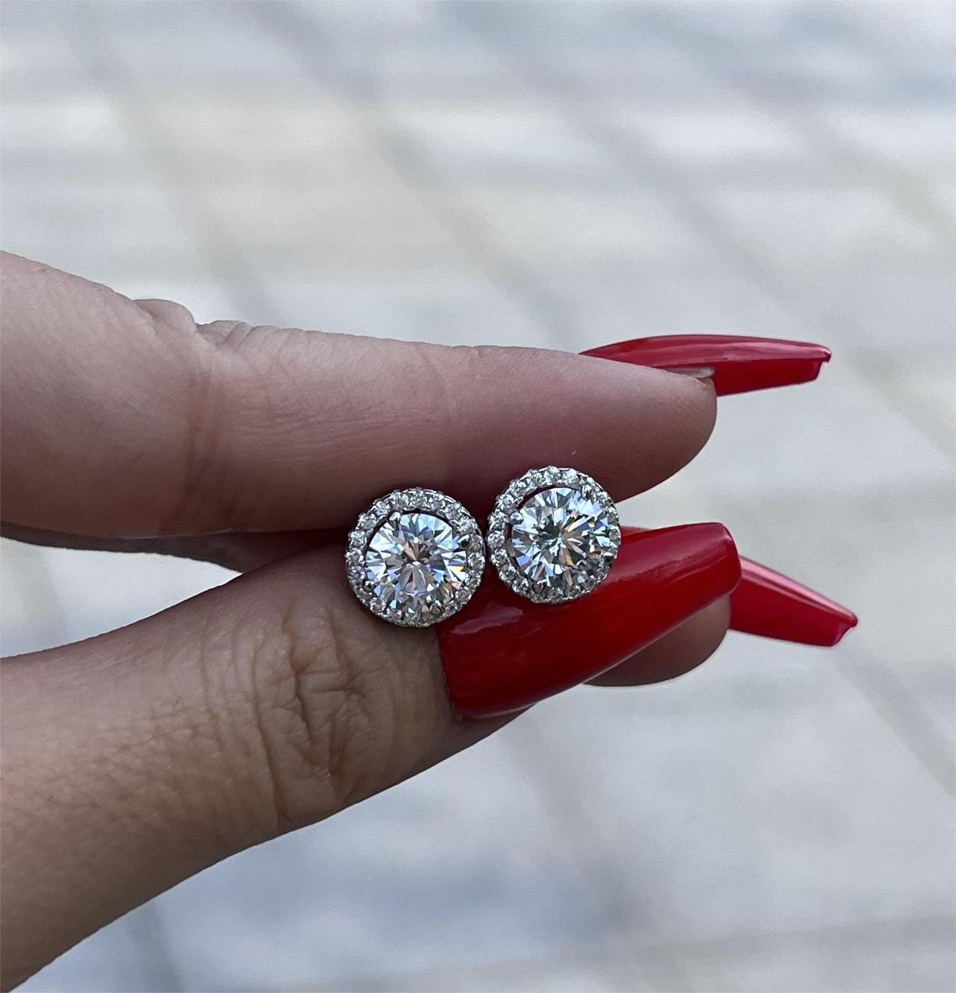 Customer photo review of Louily Sterling Silver Classic Halo Round Cut Earring