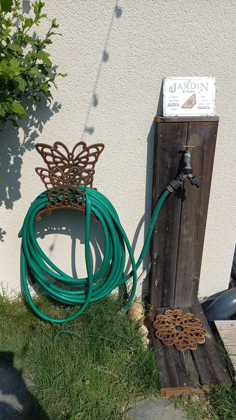 Customer photo review of Joie dans le jardin - Plaque de porte personnalisée