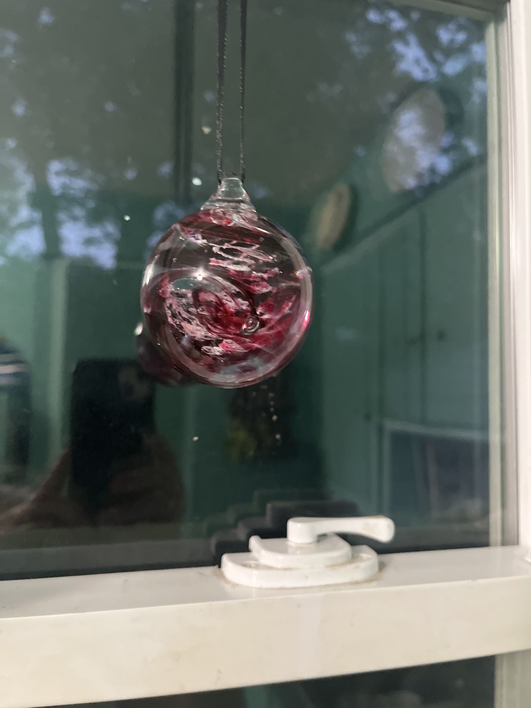 Customer photo review of Glimmer Orb with Cremation Ashes
