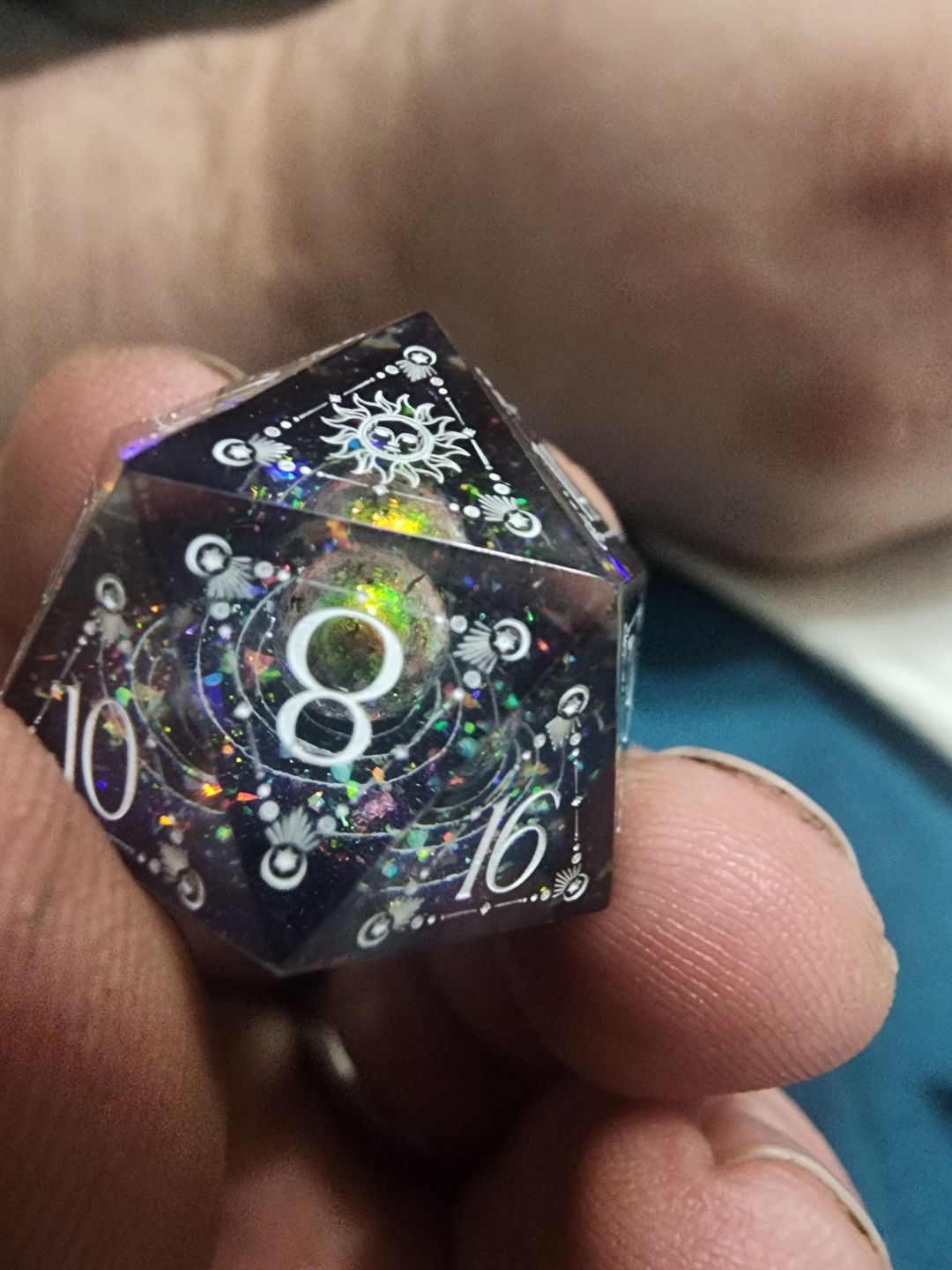 Customer photo review of URWizards D&D The Galaxy Resin Engraved Dice Set Tarot Style