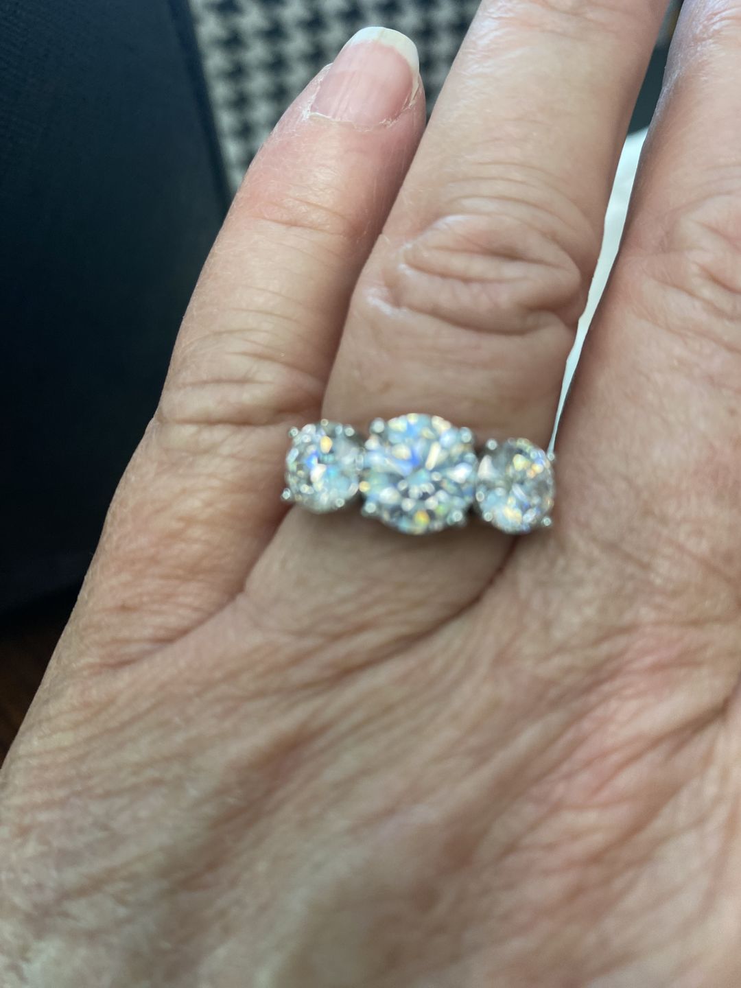 Customer photo review of Solitaire Tension Set Moissanite Bypass Engagement Ring