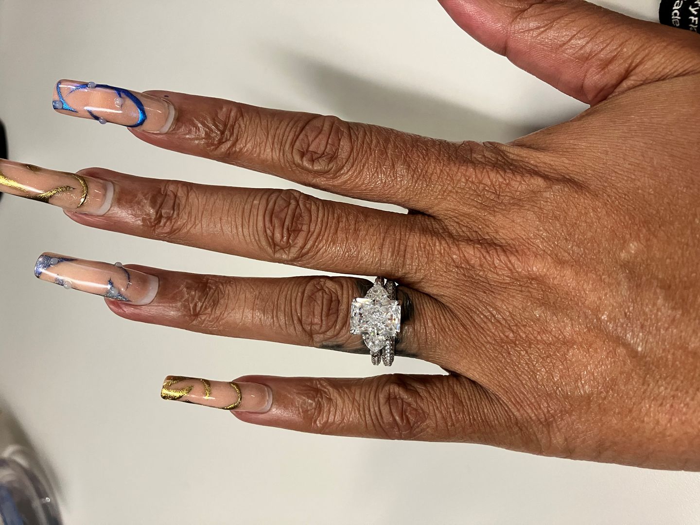 Customer photo review of S925 5.0Ct Radiant Cut & Heart Cut Three Stone Wedding Set In Sterling Silver