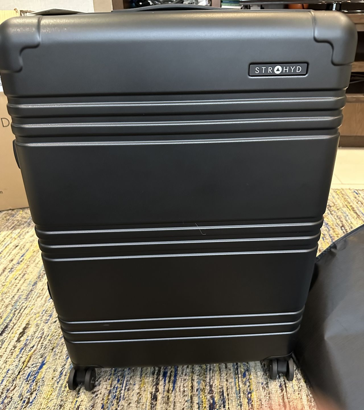 Customer photo review of Maleta Check—In .1