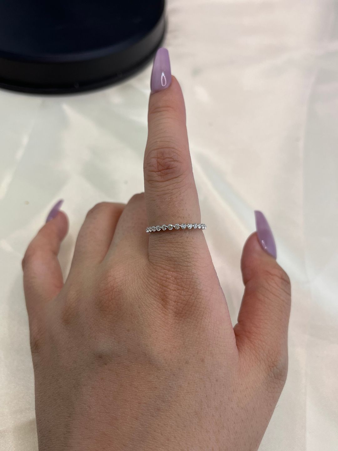 Customer photo review of Louily Classic Round Cut Full Eternity Wedding Band In Sterling Silver