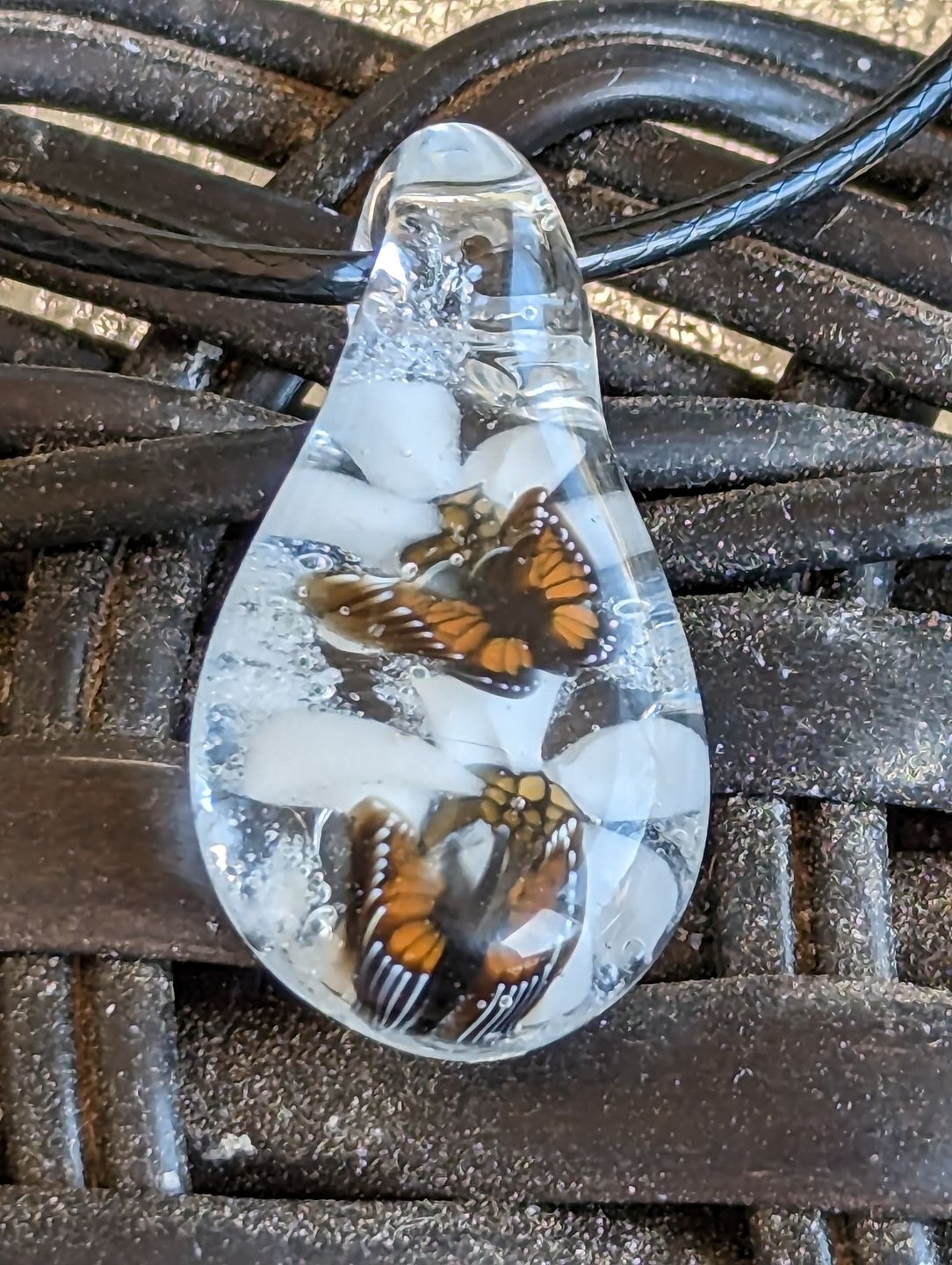 Customer photo review of Double Butterfly Pendant with Flowers and Infused Cremation Ashes