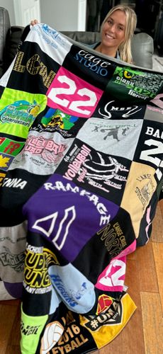 T-shirt quilt with sports, athletics themes by Constance from MI