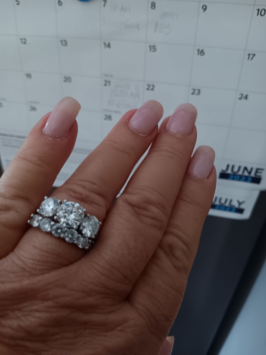 Customer photo review of Classic Three Stone Round Cut Moissanite Sterling Silver Wedding Ring