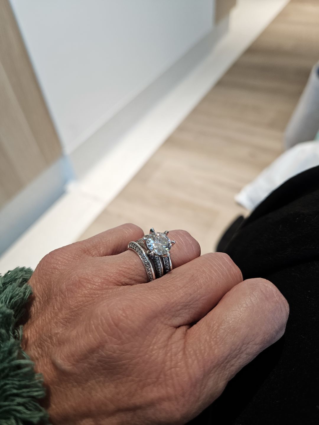 Customer photo review of Knife Edge Pave Moissanite Sterling Silver Engagement Ring
