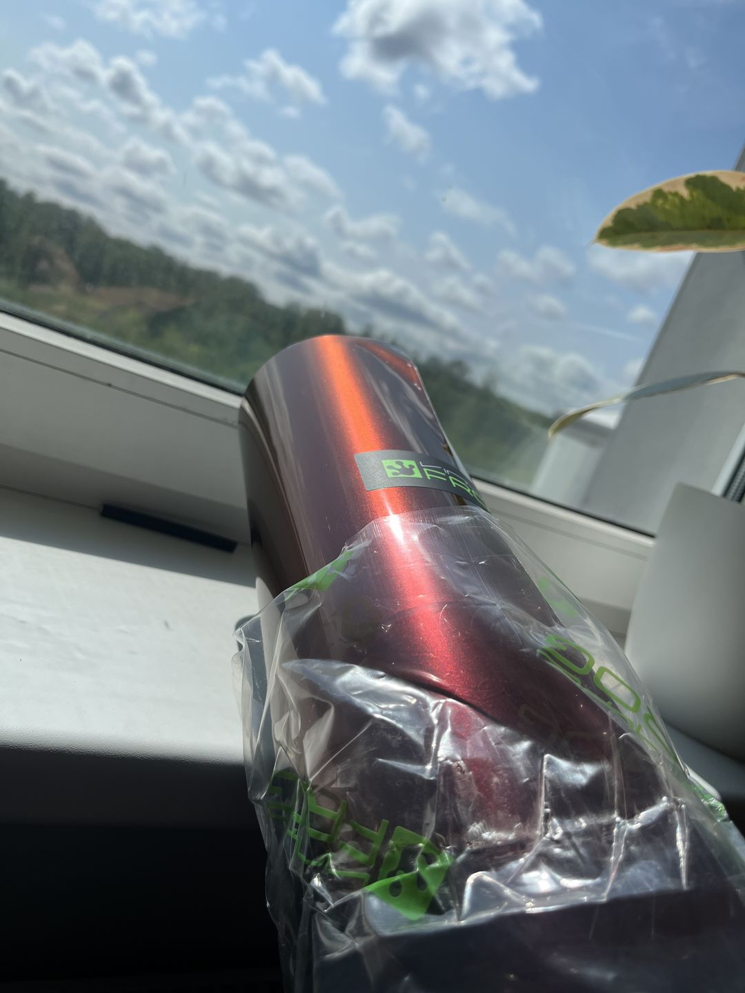 Customer photo review of Rainbow Drift Black Red Vinyl Wrap