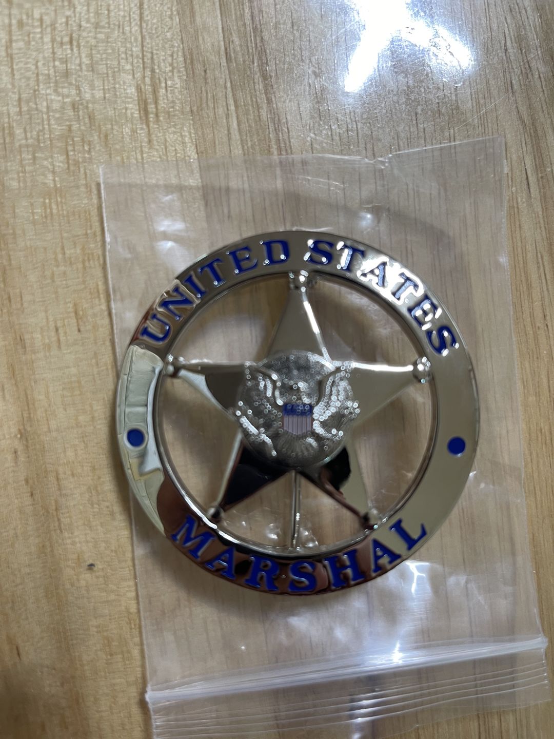 Customer photo review of US Federal Court Law Enforcement MARSHAL Badge Solid Copper Replica Movie Props