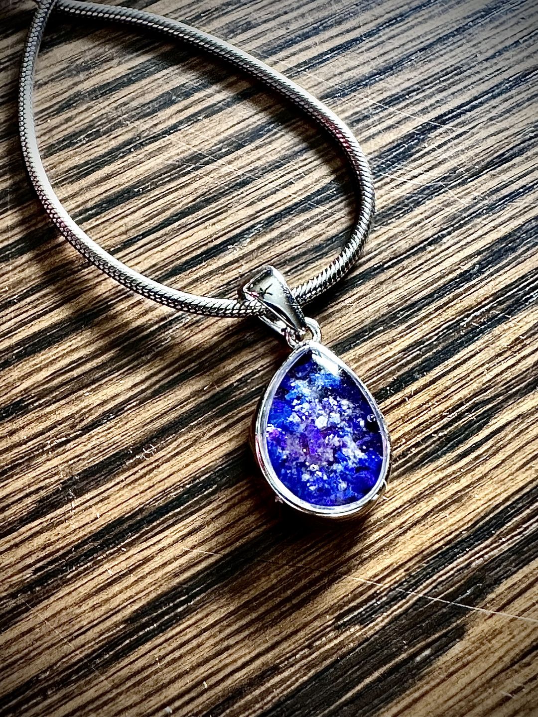 Customer photo review of Petite Pear Drop with Cremation Ashes