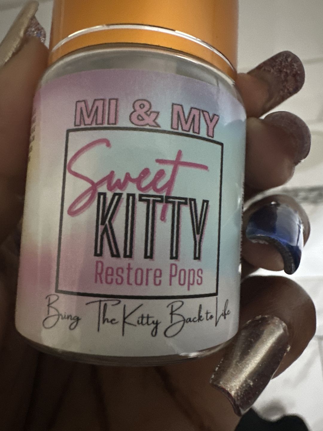 Customer photo review of Sweet Kitty Restore Pops