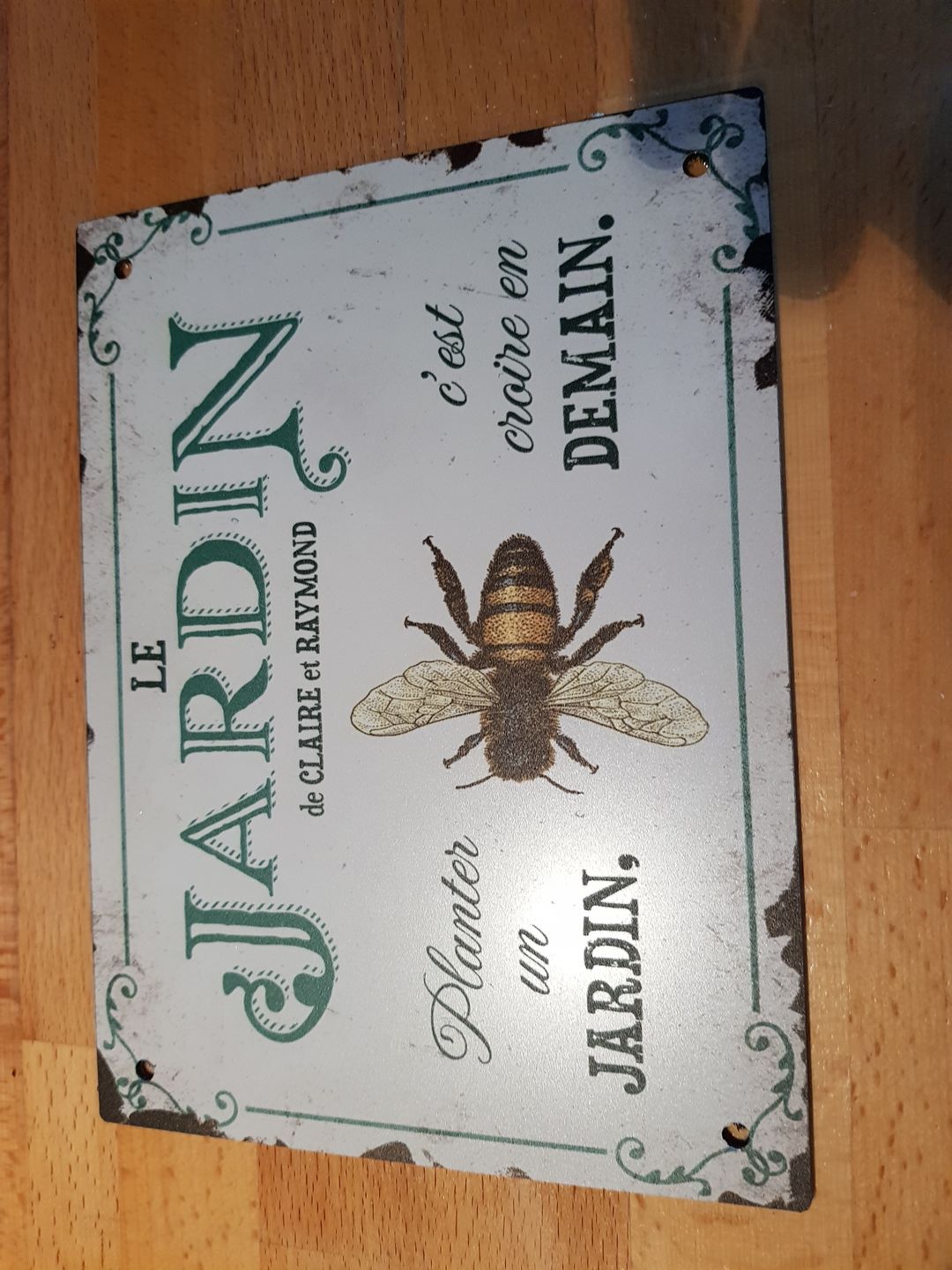 Customer photo review of Joie dans le jardin - Plaque de porte personnalisée