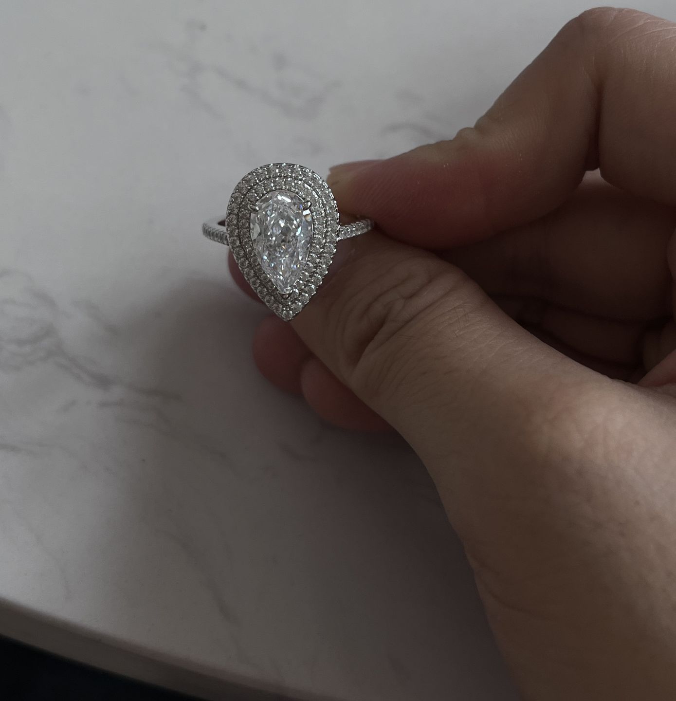 Customer photo review of Louily Double Halo Pear Cut Engagement Ring In Sterling Silver