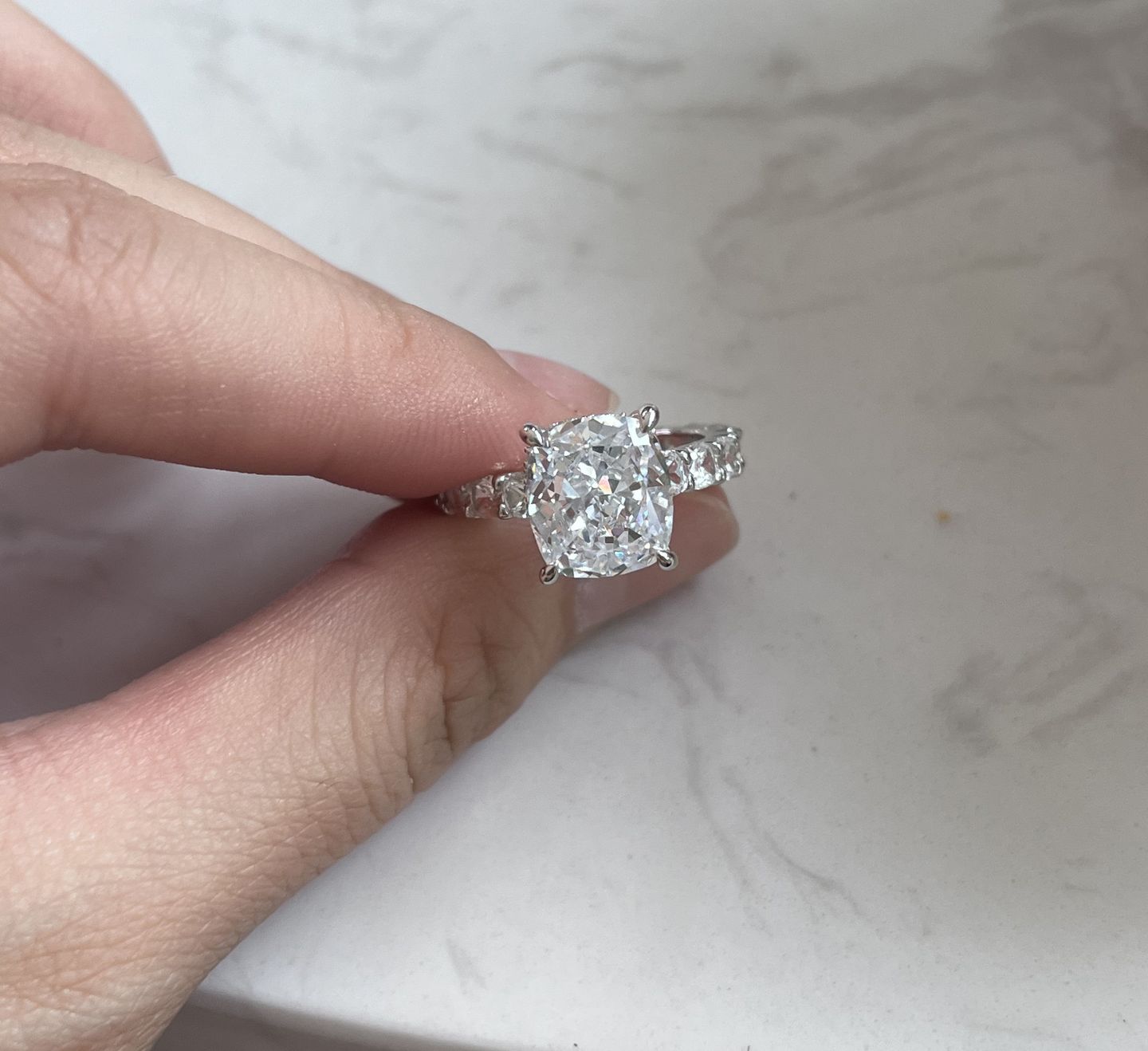 Customer photo review of Louily Stunning Sterling Silver Crushed Ice Cushion Cut Engagement Ring