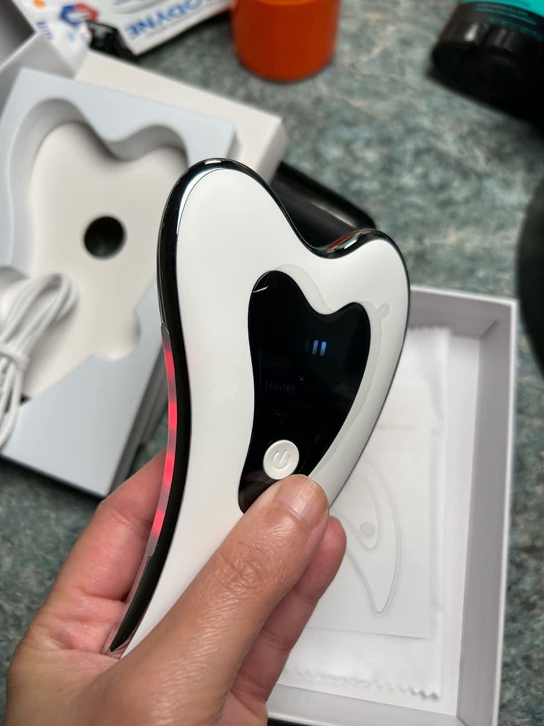 Customer photo review of Gua Sha Électrique 4-en-1 - Vibration, Chaleur & LED