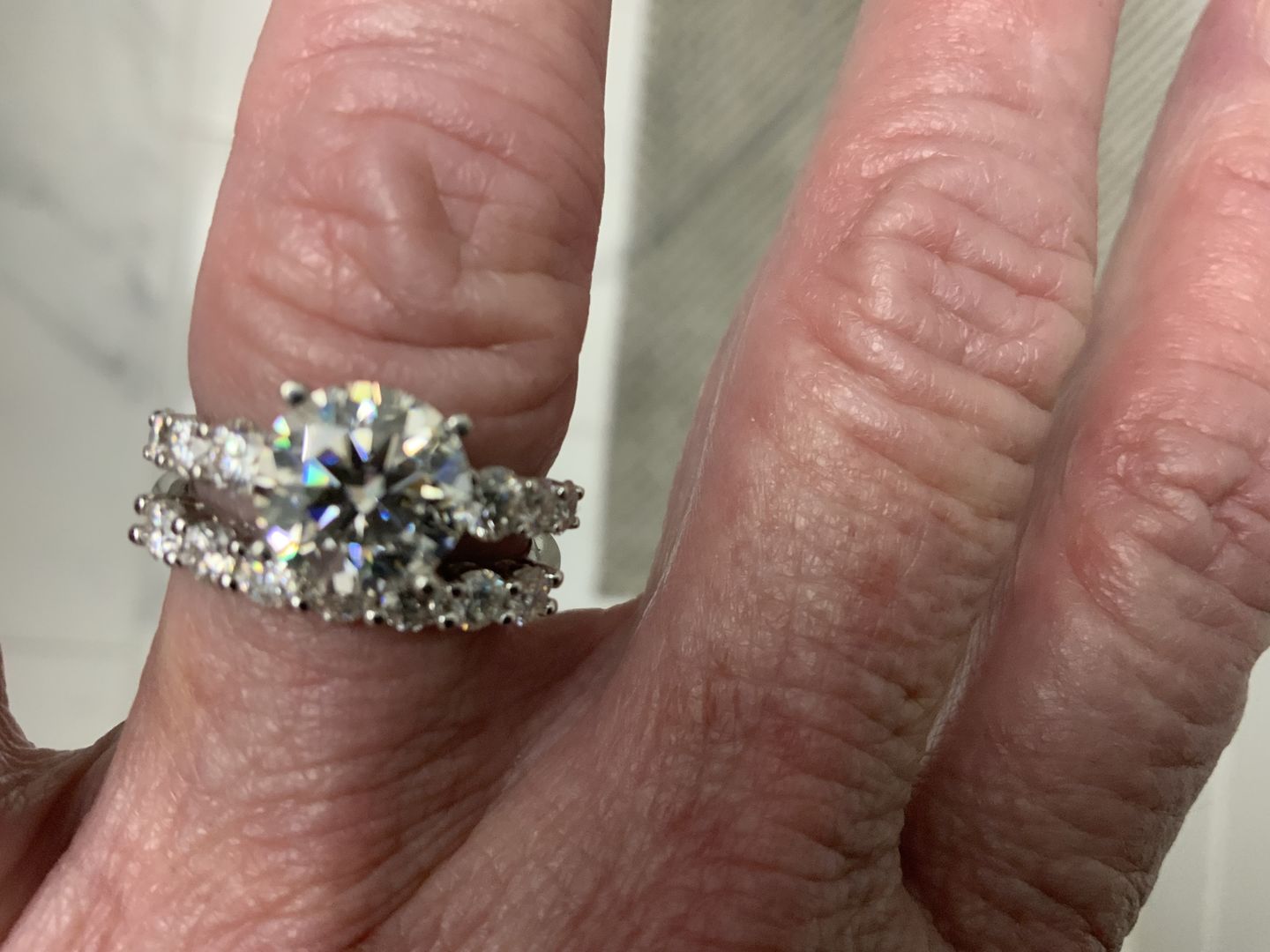 Customer photo review of Round Moissanite Sterling Silver Wedding Band Stackable Ring