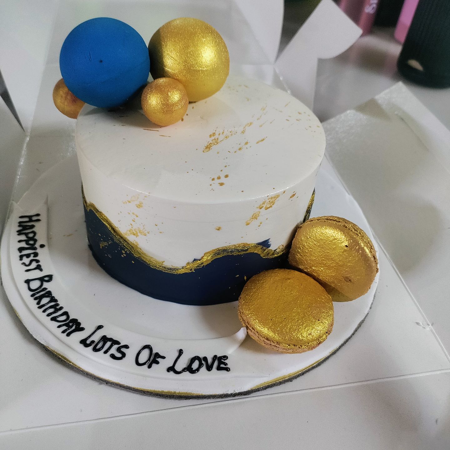 Customer photo review of Gold Splash Blue Cake