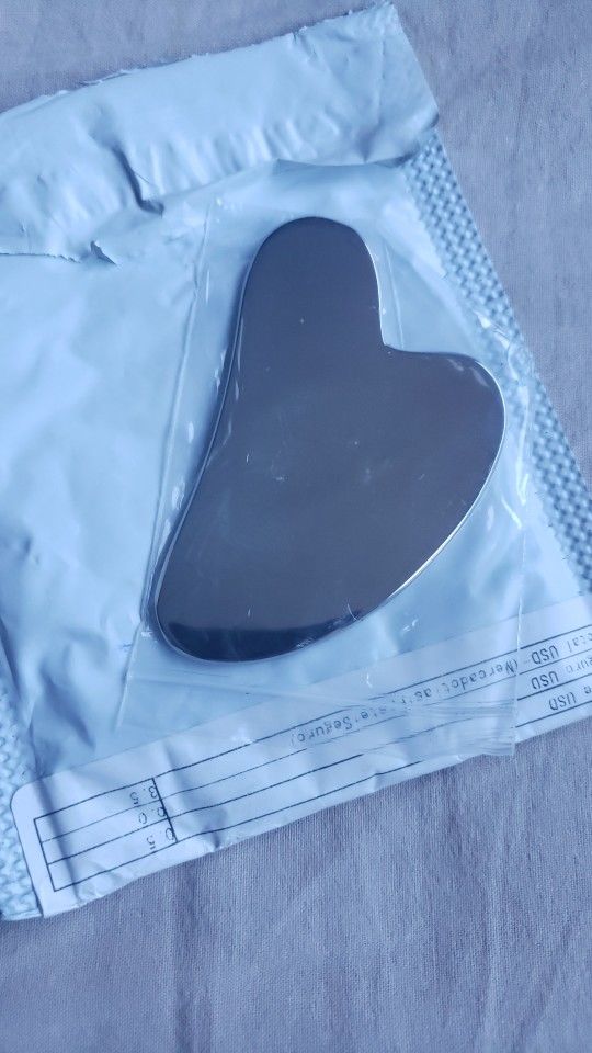 Customer photo review of Gua Sha Acier Inoxydable