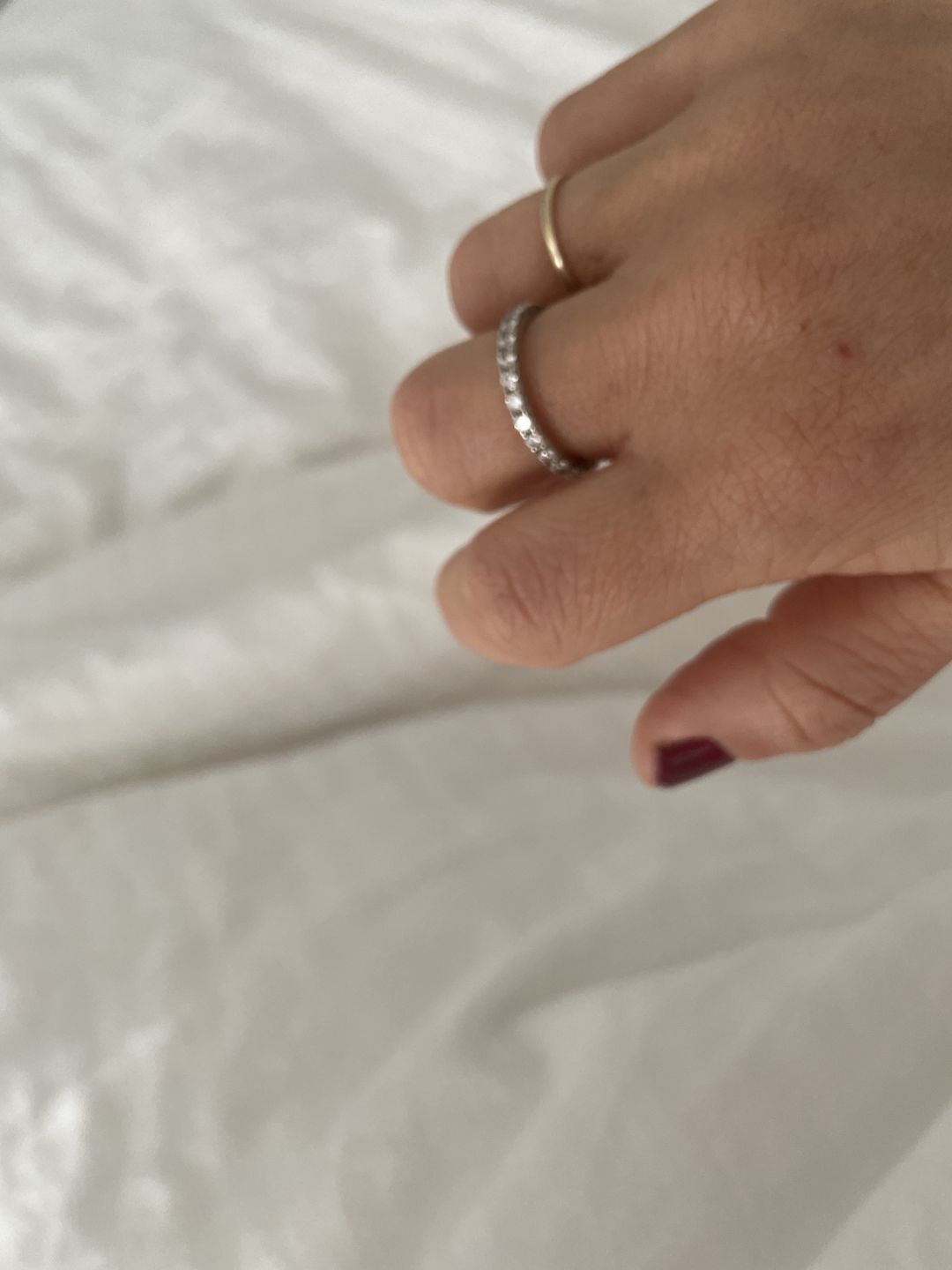 Customer photo review of Pave Moissanite Eternity Wedding Band Ring In Sterling Silver